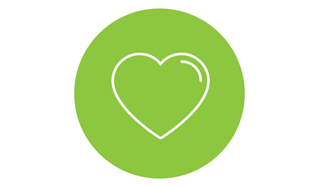 En grön platta med ett vitt hjärta illustrerat